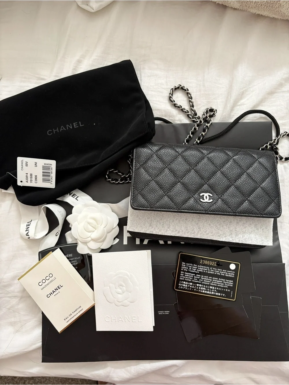 CHANEL Black Quilted Caviar Leather Crossbody Wallet with Silver Chain